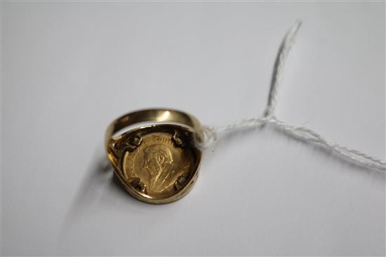 A 1896 1/10 gold krugerrand in 9ct gold ring setting, size S.